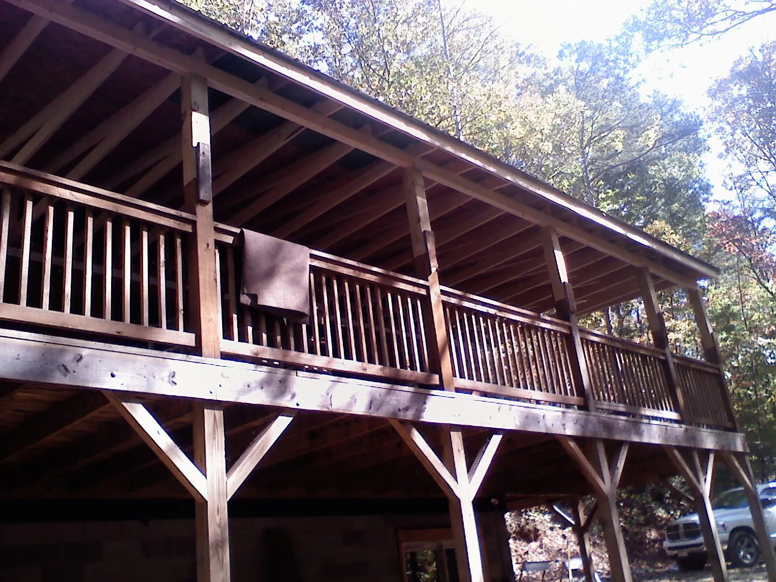 Timber framing under a new elevated porch and deck — Roof Leak Repair in Larimer by Roofing Brothers